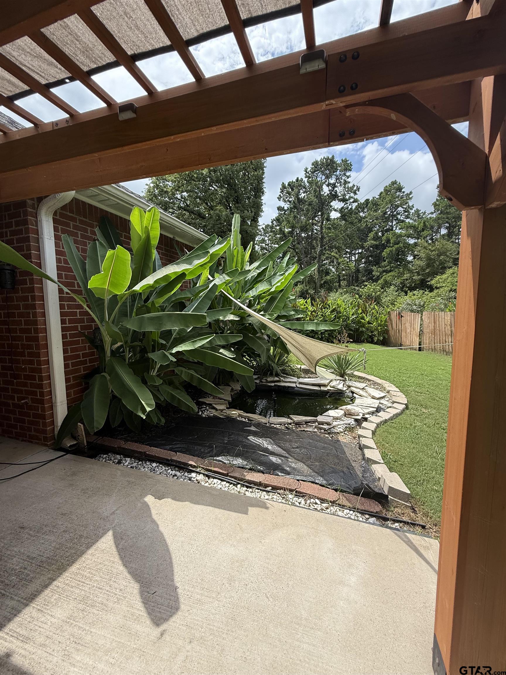 3204 Pebblebrook Circle Tyler, TX 75707 - Photo 15 of 18 a view of a porch with furniture