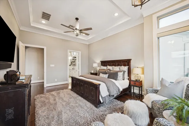 a spacious bathroom with a granite countertop sink mirror and bathtub
