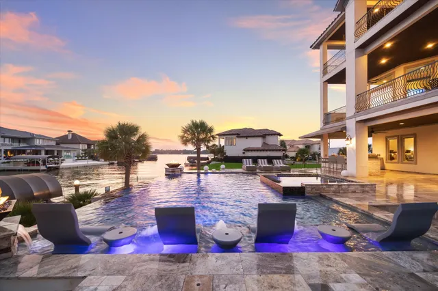 a front view of a house with swimming pool