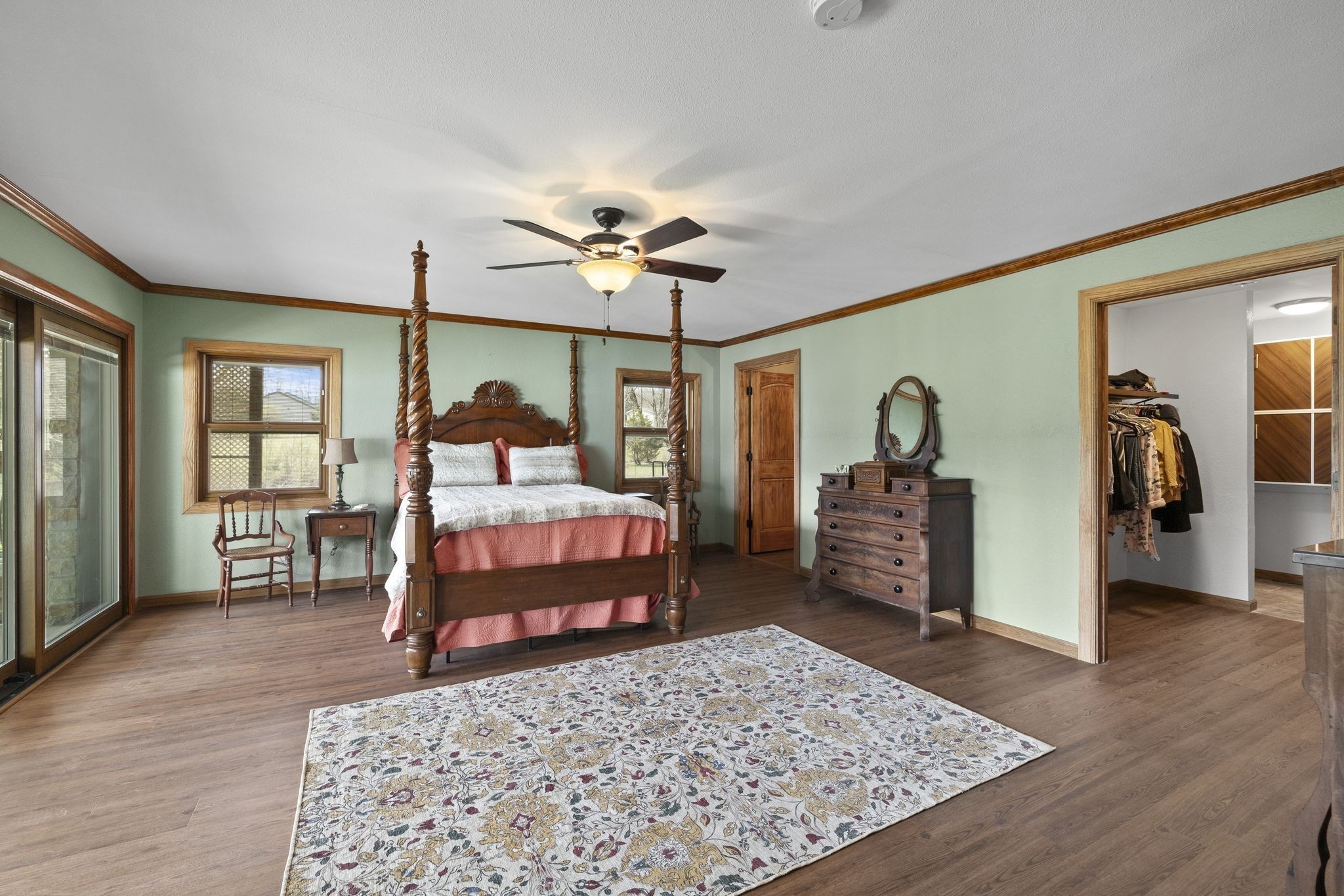 10669 South Windrow Road Rockvale, TN 37153 - Photo 20 of 53 a bedroom with a bed a chandelier and closet