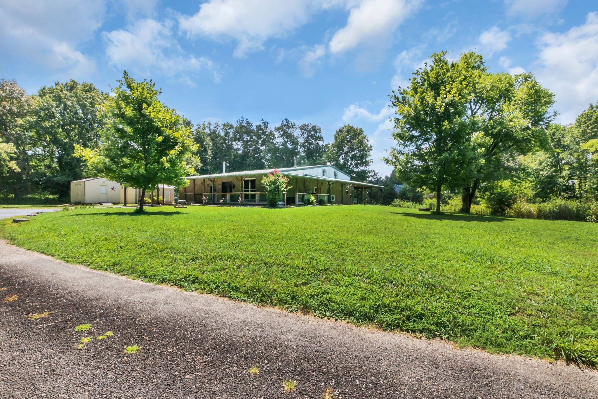 10669 South Windrow Road Rockvale, TN 37153 - Photo 3 of 53 a view of a garden with trees