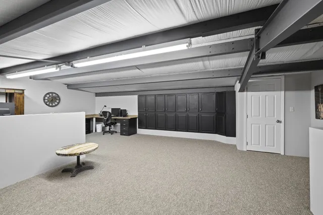 a room with furniture and a window