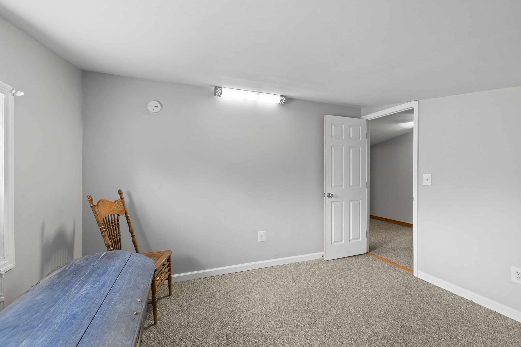 10669 South Windrow Road Rockvale, TN 37153 - Photo 39 of 53 a view of room with wooden floor and chair