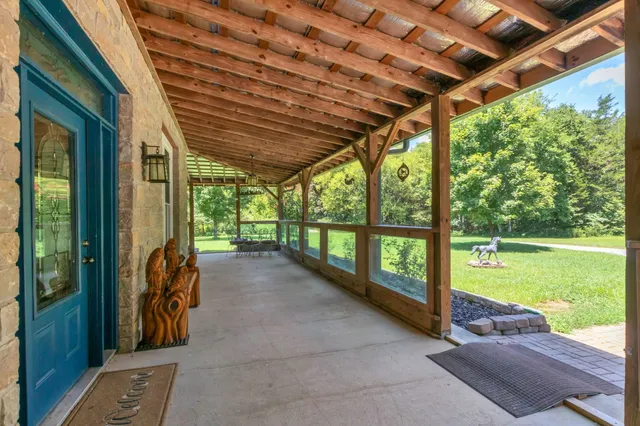 a view of a backyard of the house