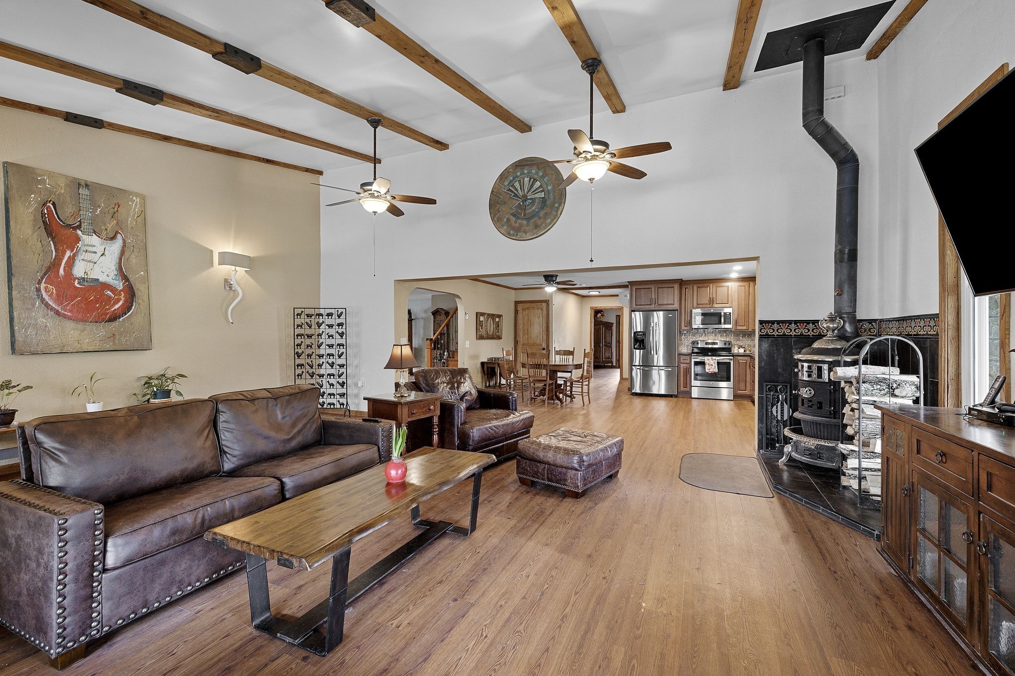 10669 South Windrow Road Rockvale, TN 37153 - Photo 9 of 53 a living room with furniture a flat screen tv and a ceiling fan