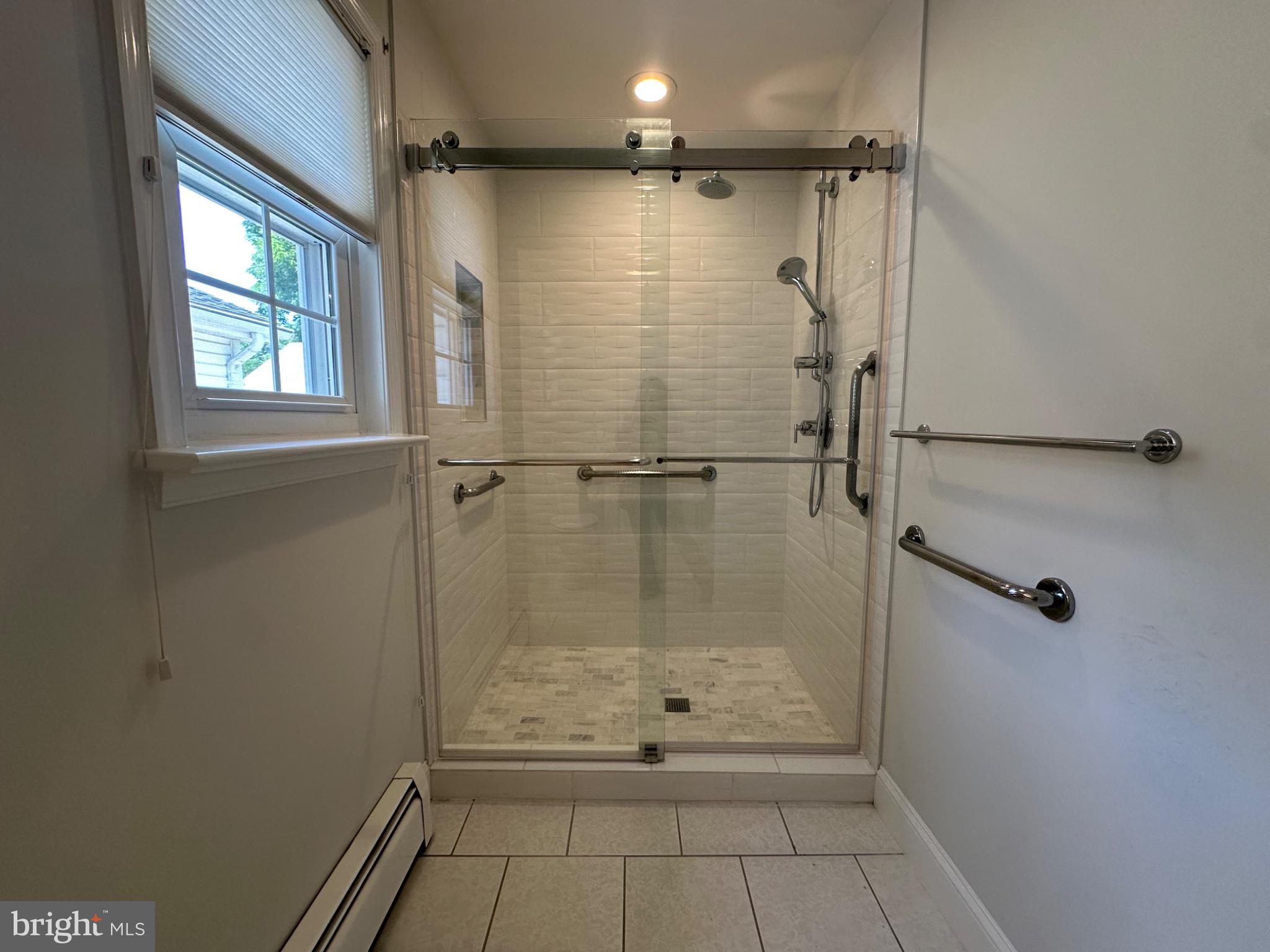 14616 Sturtevant Road Silver Spring, MD 20905 - Photo 20 of 44 Bathroom2-Sleek glass shower in modern design.