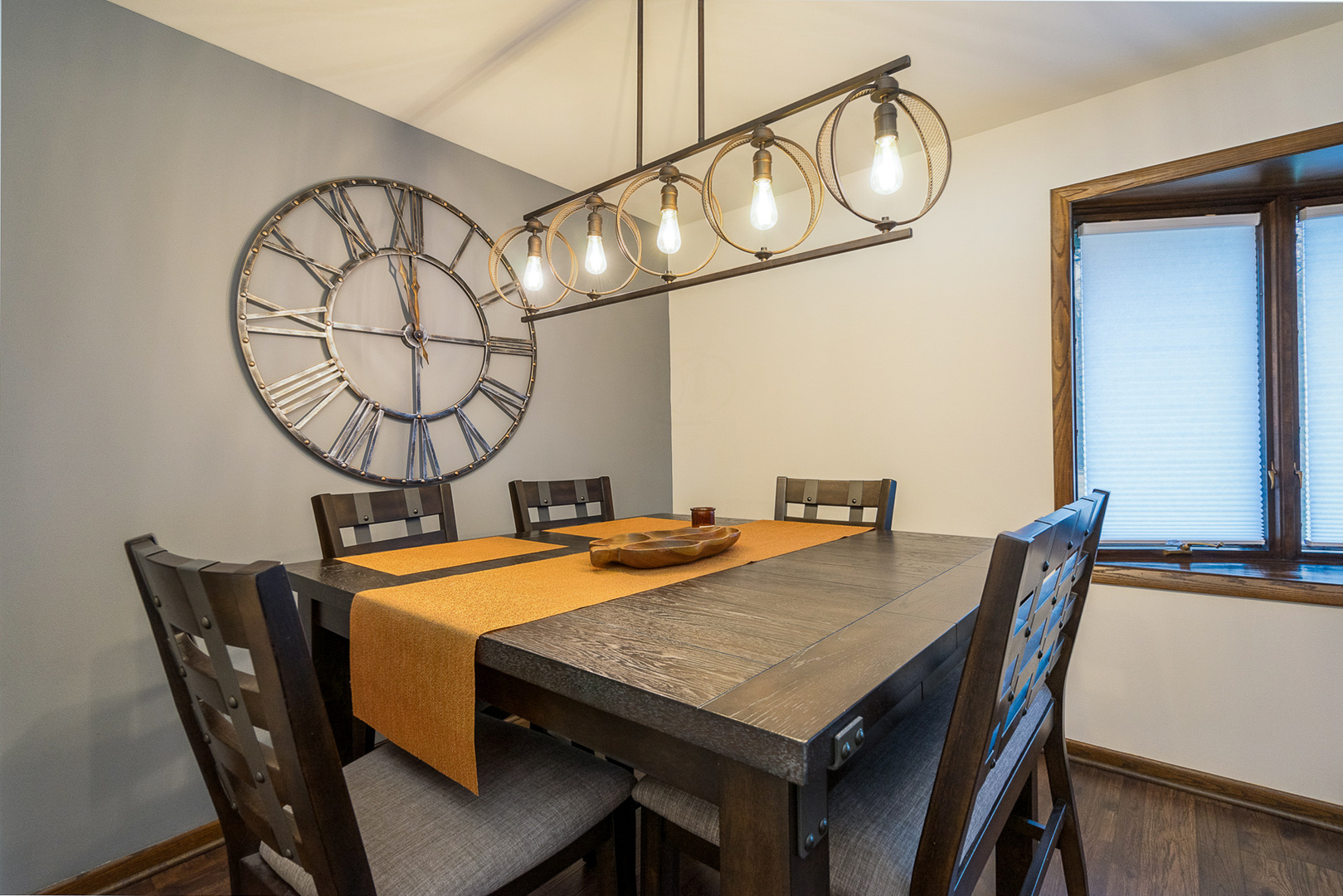 1101 Ridge Road Homewood, IL 60430 - Photo 6 of 25 a view of a dining room with furniture a chandelier and wooden floor