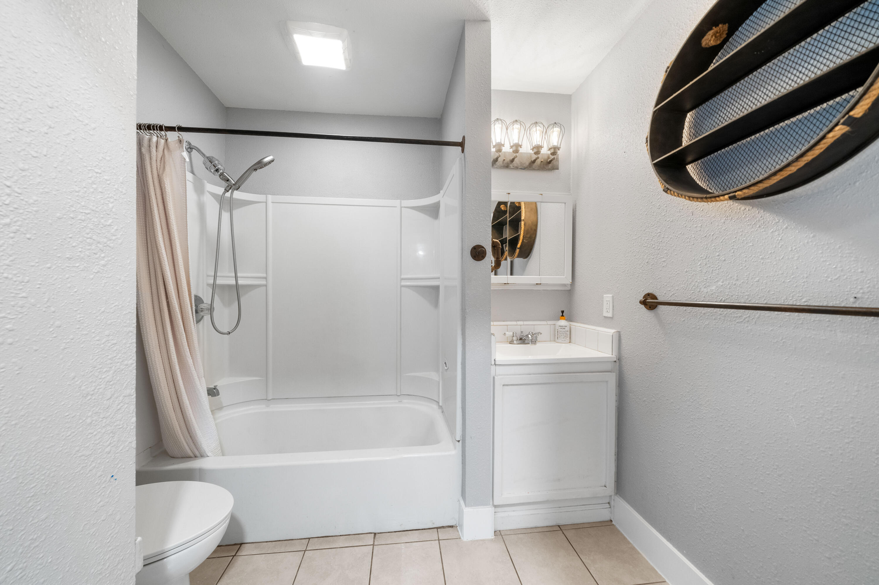 2648 Tremonto Road Anderson, CA 96007 - Photo 23 of 41 a bathroom with a bathtub and a shower