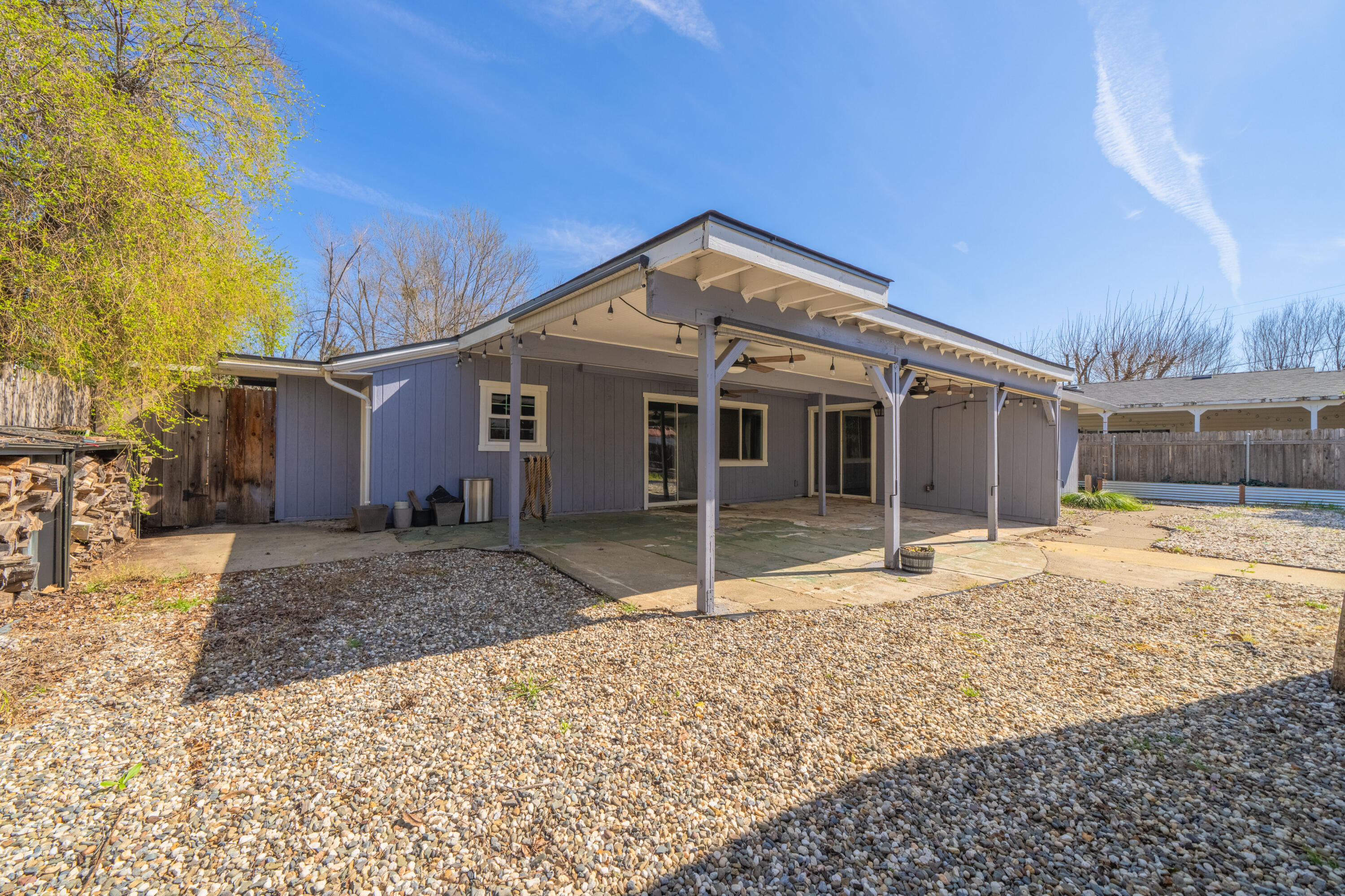 2648 Tremonto Road Anderson, CA 96007 - Photo 26 of 41 a front view of a house with a yard and garage
