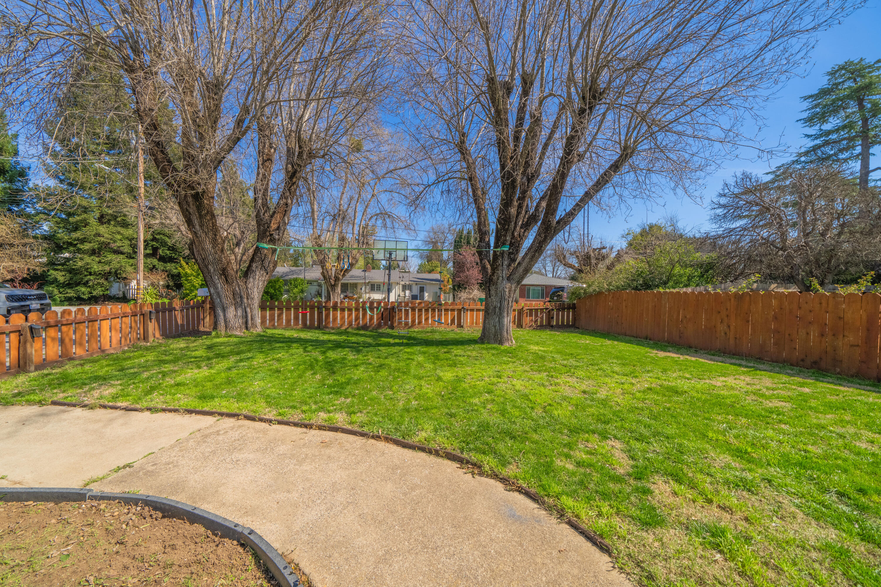2648 Tremonto Road Anderson, CA 96007 - Photo 3 of 41 a view of a park with large trees