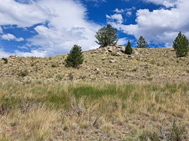 a picture of a bathroom with a shower