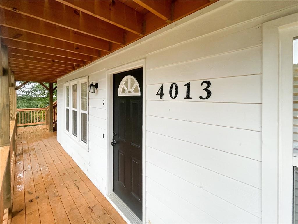 4013 Hawthorne Circle, Unit 2 Smyrna, GA 30080 - Photo 4 of 18 a view of a hallway with wooden floor