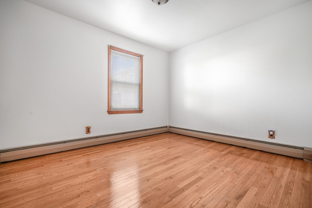 256 Rhode Island Avenue Fall River, MA 02724 - Photo 27 of 36 an empty room with a window