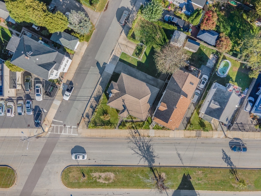 256 Rhode Island Avenue Fall River, MA 02724 - Photo 31 of 36 an aerial view of a house with a yard and sitting space
