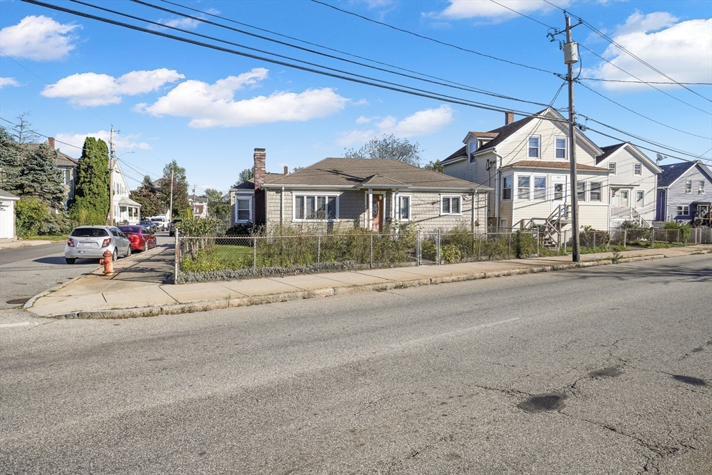 256 Rhode Island Avenue Fall River, MA 02724 - Photo 7 of 36 a view of multiple houses with a street