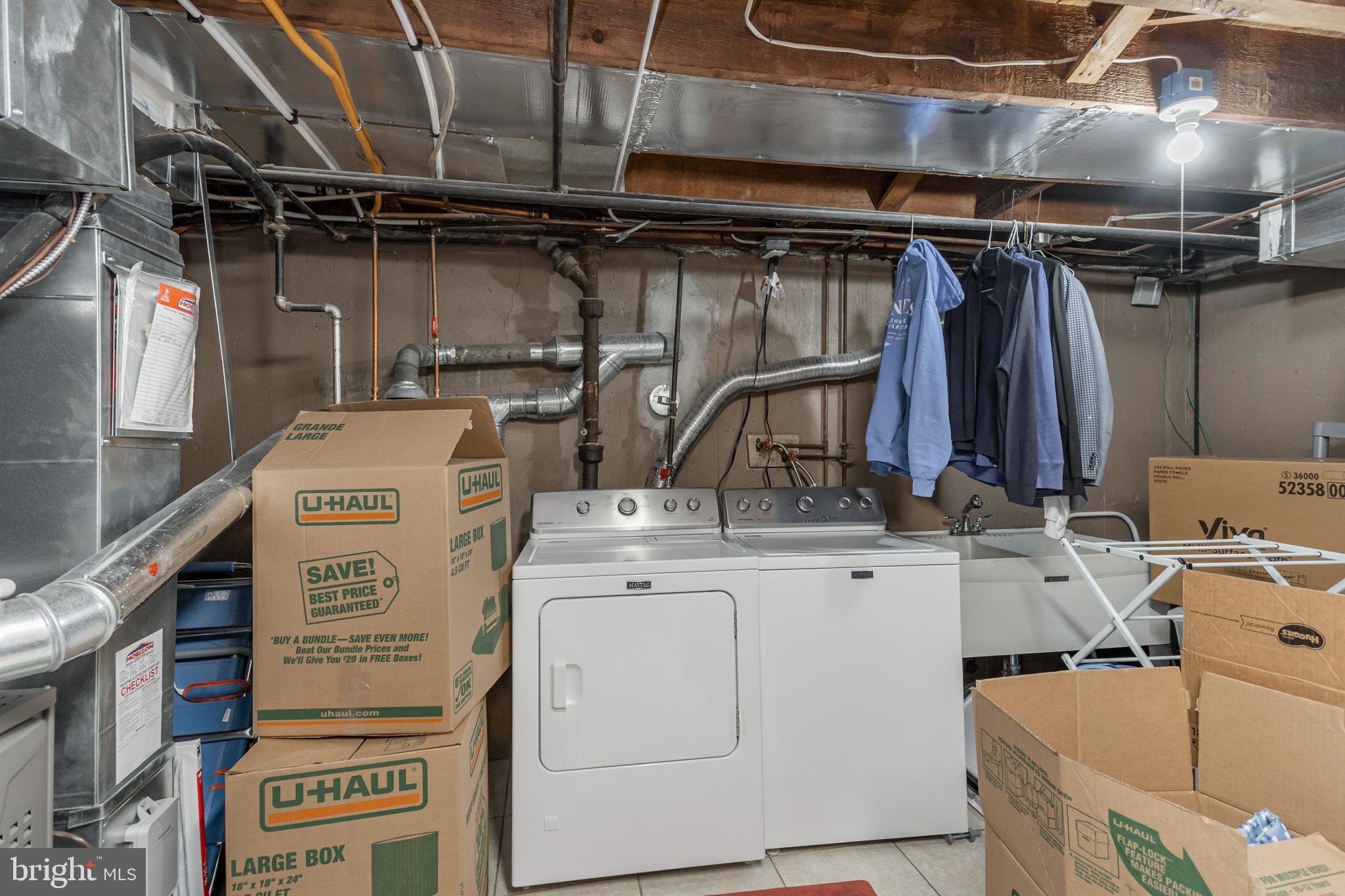 211 Pembroke Road Havertown, PA 19083 - Photo 31 of 37 Basement Storage, Laundry and Utility Room