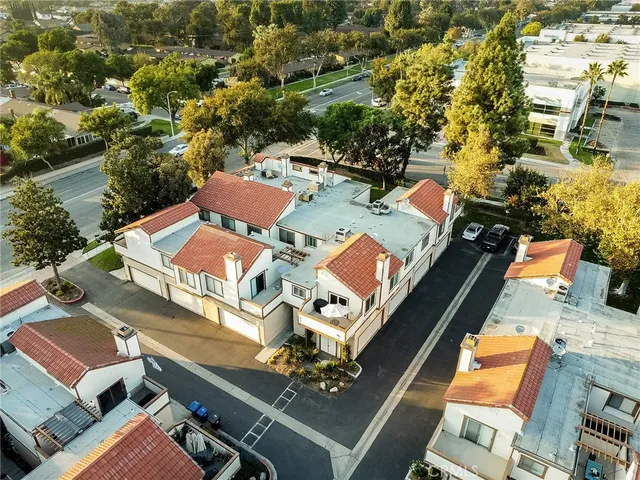 an aerial view of a house with a swimming pool