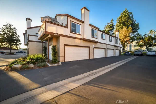 a front view of a house with yard