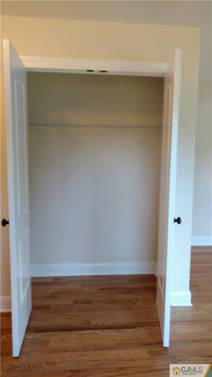 2028 Oak Tree Road Edison, NJ 08820 - Photo 23 of 39 a view of room with wooden floor