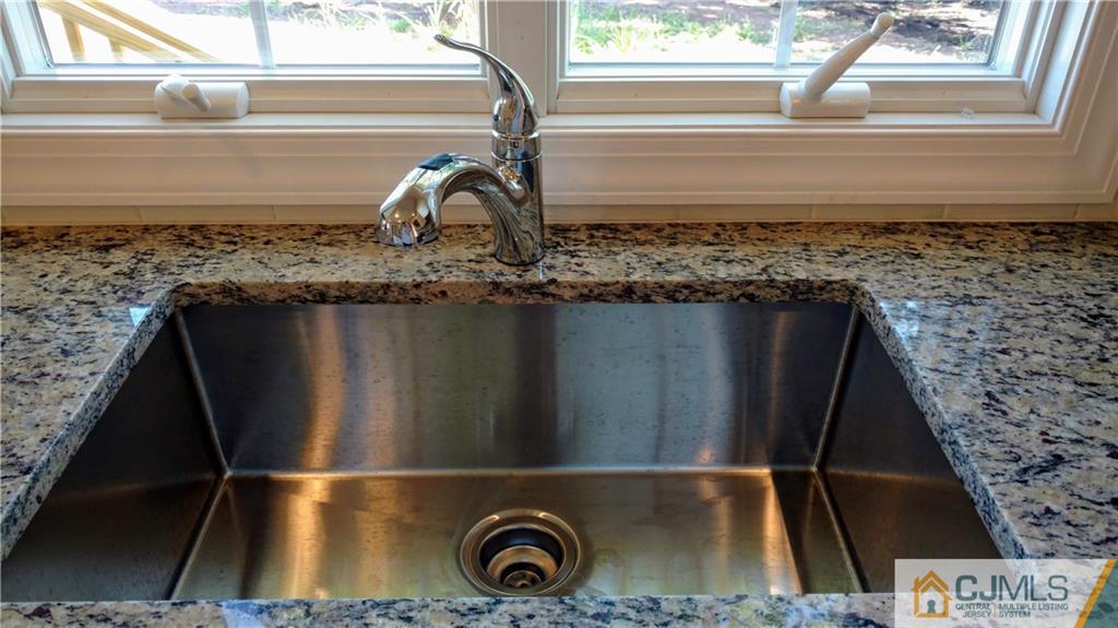 2028 Oak Tree Road Edison, NJ 08820 - Photo 9 of 39 a close view of sink and window