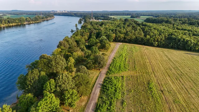 a view of swimming pool from a balcony