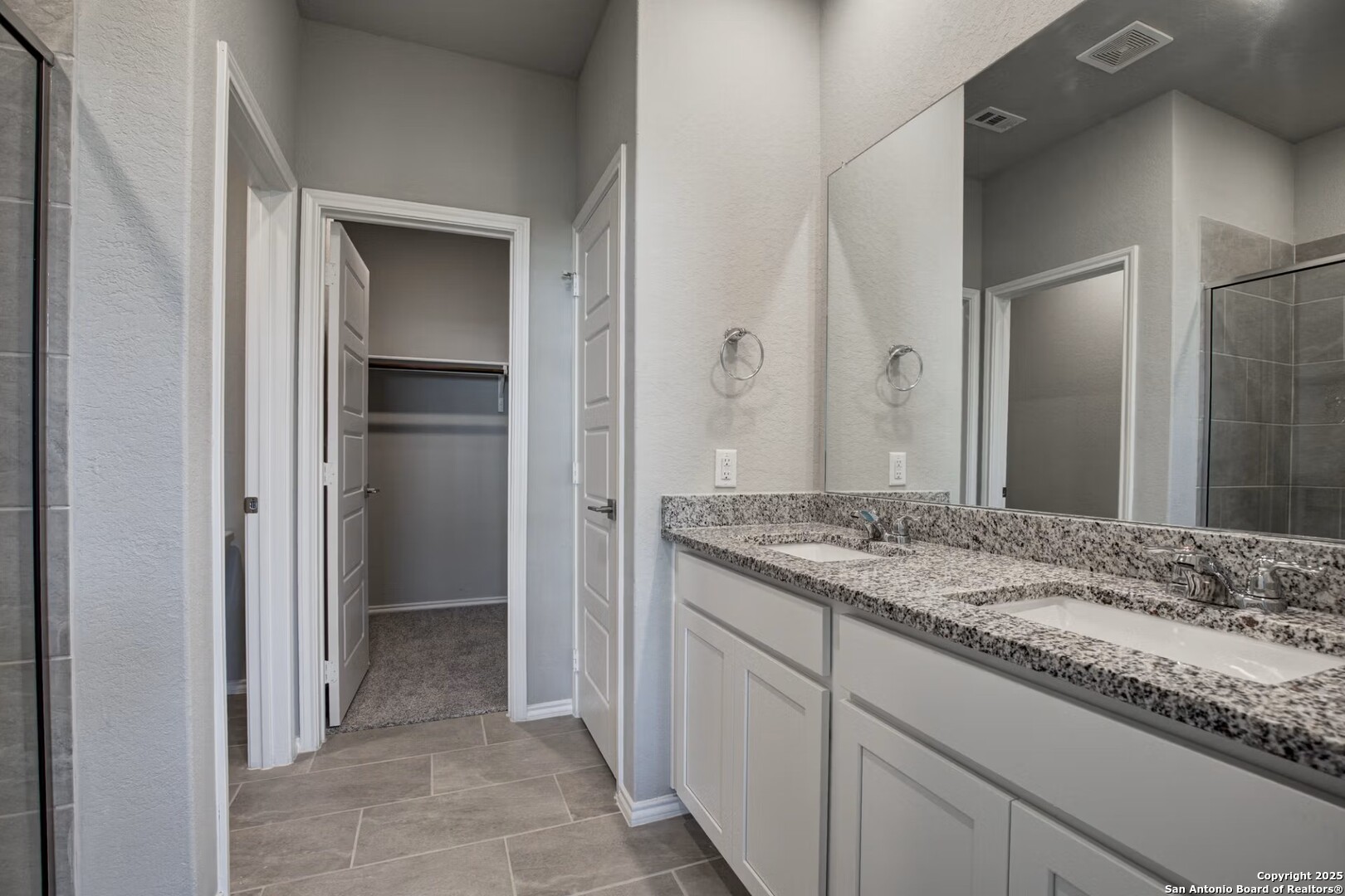 3453 Meteor Night Converse, TX 78109 - Photo 15 of 22 a bathroom with a granite countertop sink and a mirror