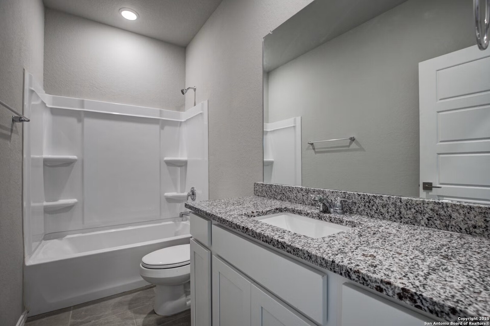 3453 Meteor Night Converse, TX 78109 - Photo 21 of 22 a bathroom with a granite countertop sink toilet and shower