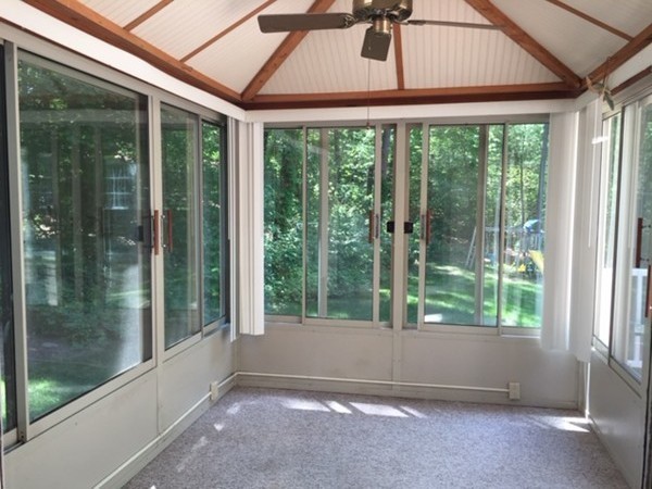 17 Virginia Road Tyngsborough, MA 01879 - Photo 14 of 19 a view of backyard with green space and balcony
