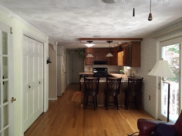 17 Virginia Road Tyngsborough, MA 01879 - Photo 3 of 19 a view of dining room with furniture and wooden floor