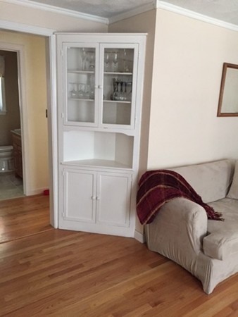 17 Virginia Road Tyngsborough, MA 01879 - Photo 5 of 19 a bedroom with a bed and wooden floor