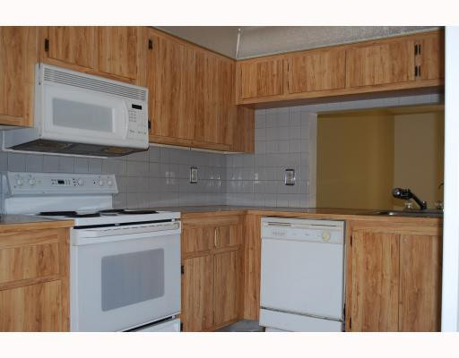 5472 Gate Lake Road, Unit 5472 Tamarac, FL 33319 - Photo 4 of 8 Kitchen