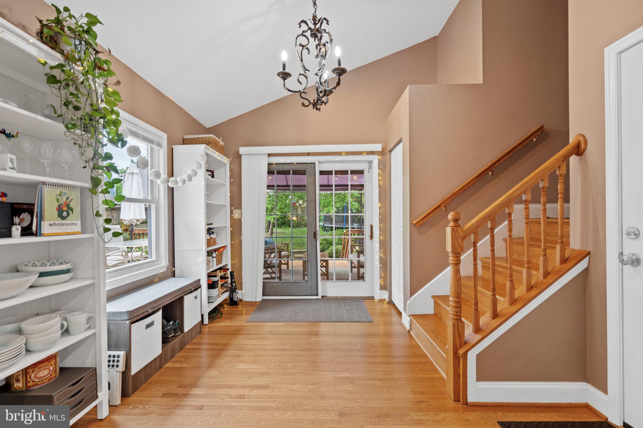 6823 Churchill Road McLean, VA 22101 - Photo 24 of 40 a view of a hallway with wooden floor and staircase