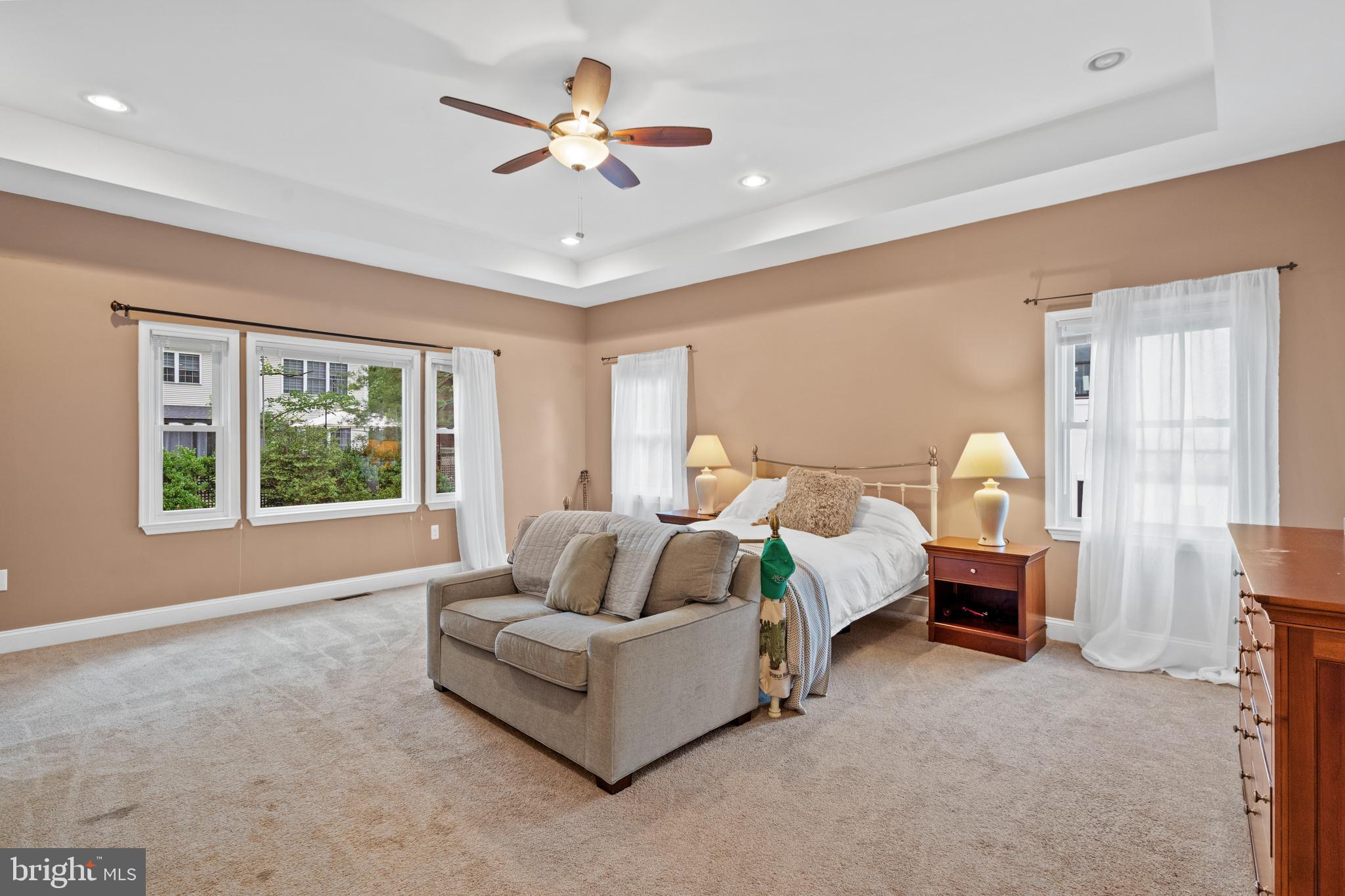 6823 Churchill Road McLean, VA 22101 - Photo 26 of 40 a spacious bedroom with a bed couch and window