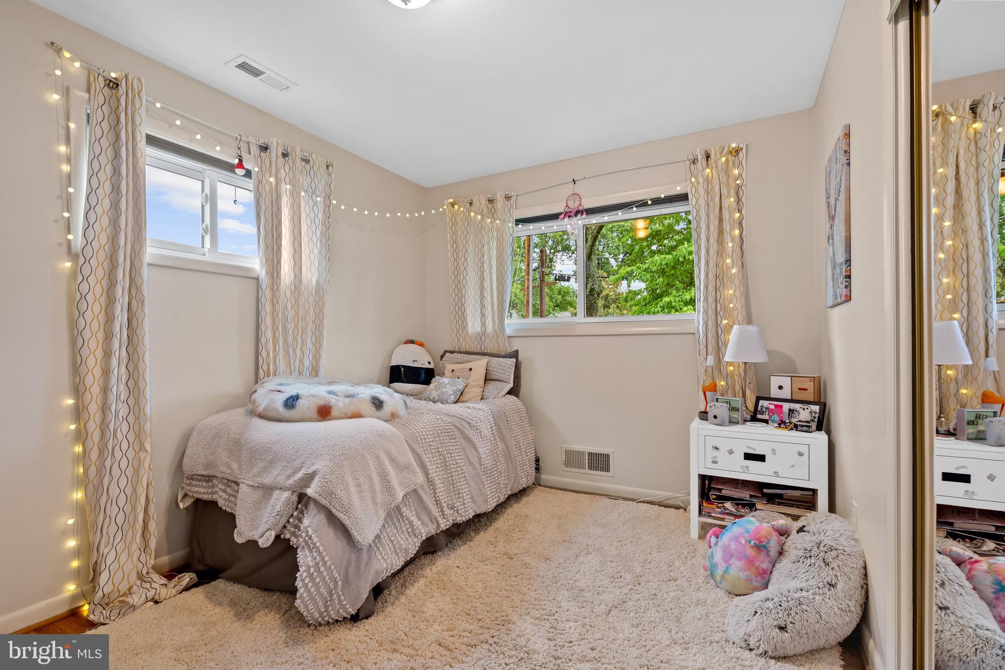 6823 Churchill Road McLean, VA 22101 - Photo 34 of 40 a bedroom with bed and a window