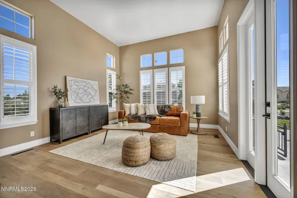 a living room with furniture or couch and a window