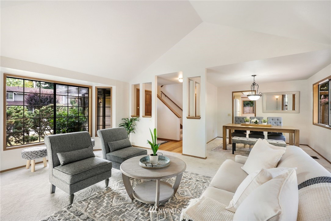 13024 Northeast 184th Place Bothell, WA 98011 - Photo 2 of 27 a living room with furniture and a large window