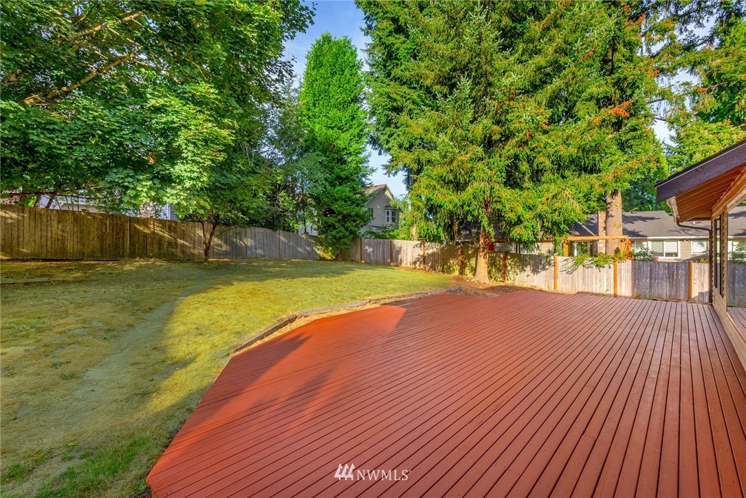13024 Northeast 184th Place Bothell, WA 98011 - Photo 16 of 27 a view of a house with swimming pool