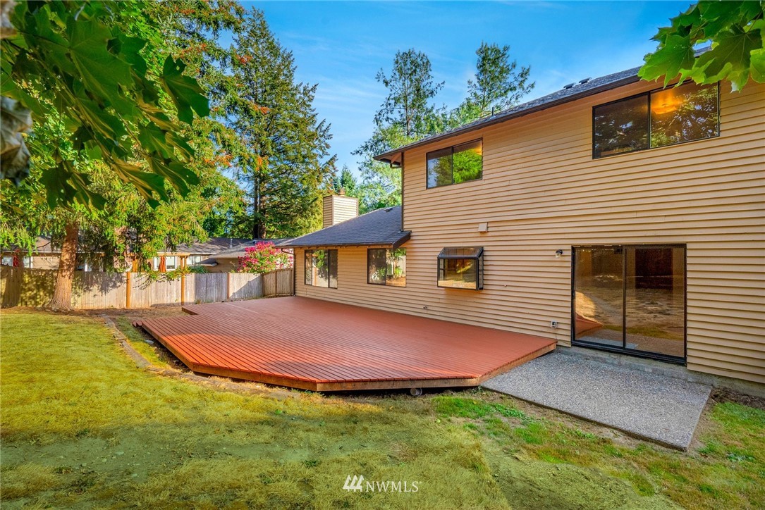 13024 Northeast 184th Place Bothell, WA 98011 - Photo 17 of 27 a view of a house with backyard and sitting area