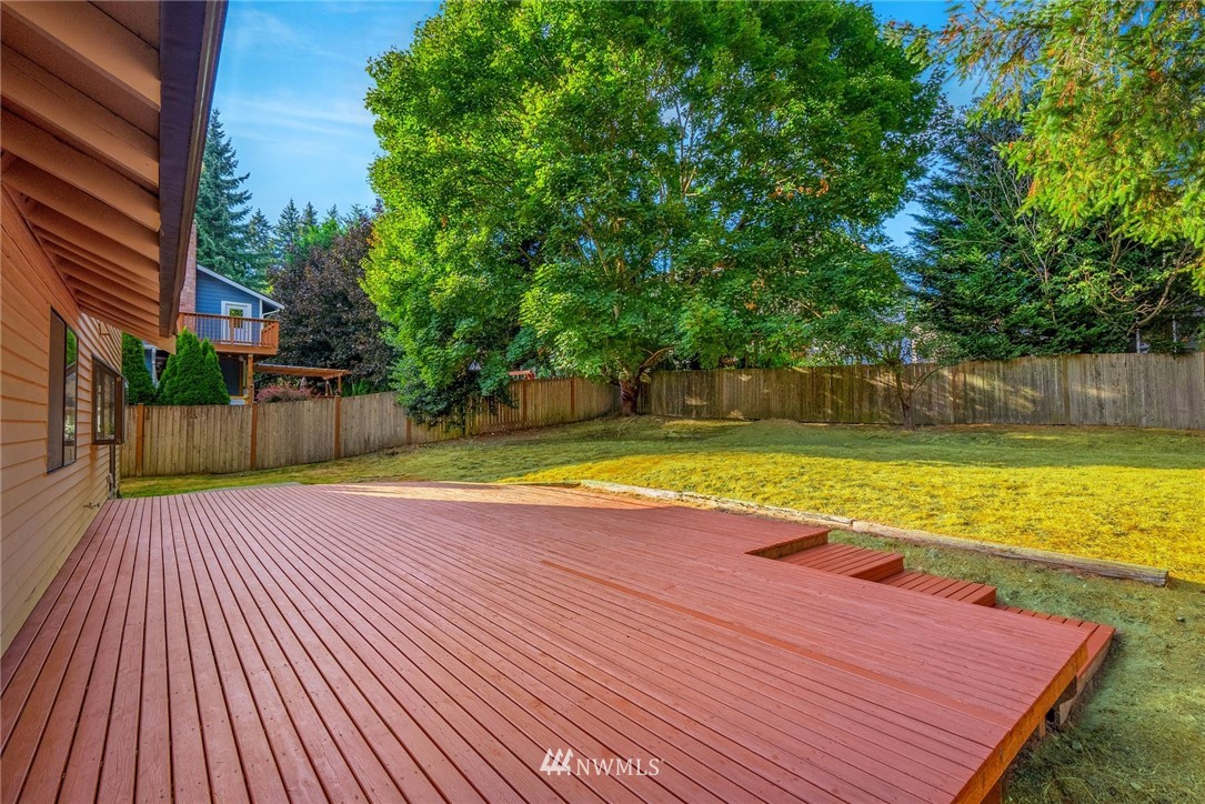 13024 Northeast 184th Place Bothell, WA 98011 - Photo 19 of 27 a view of a swimming pool with a patio