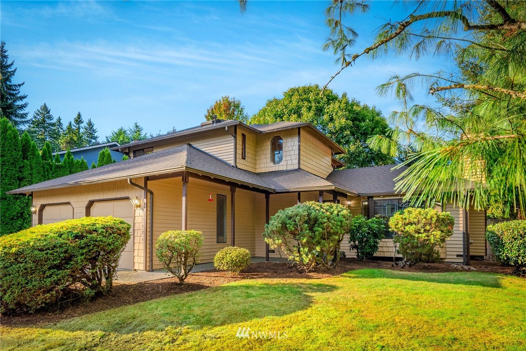 13024 Northeast 184th Place Bothell, WA 98011 - Photo 22 of 27 a view of a house with a yard