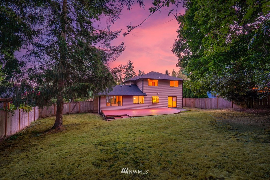 13024 Northeast 184th Place Bothell, WA 98011 - Photo 24 of 27 a sign that is sitting in front of a house