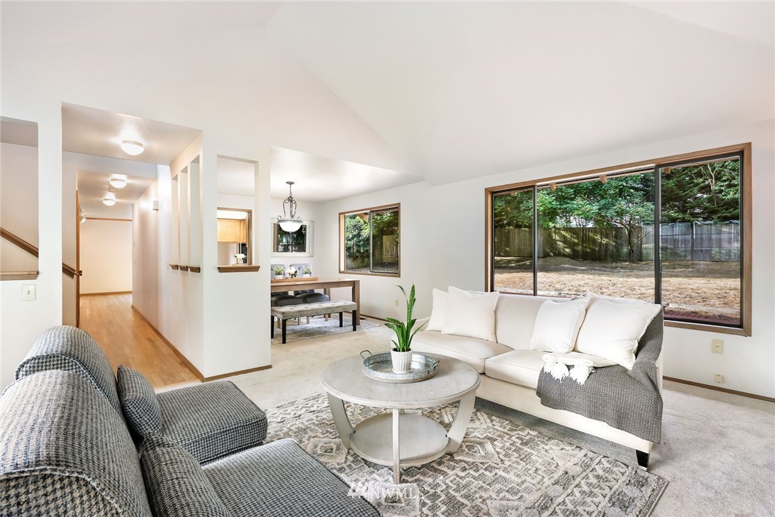 13024 Northeast 184th Place Bothell, WA 98011 - Photo 4 of 27 a living room with furniture and a large window