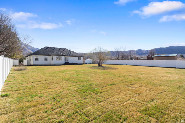 13176 Day Court Draper, UT 84020 - Photo 36 of 45 Fenced backyard with a mountain view