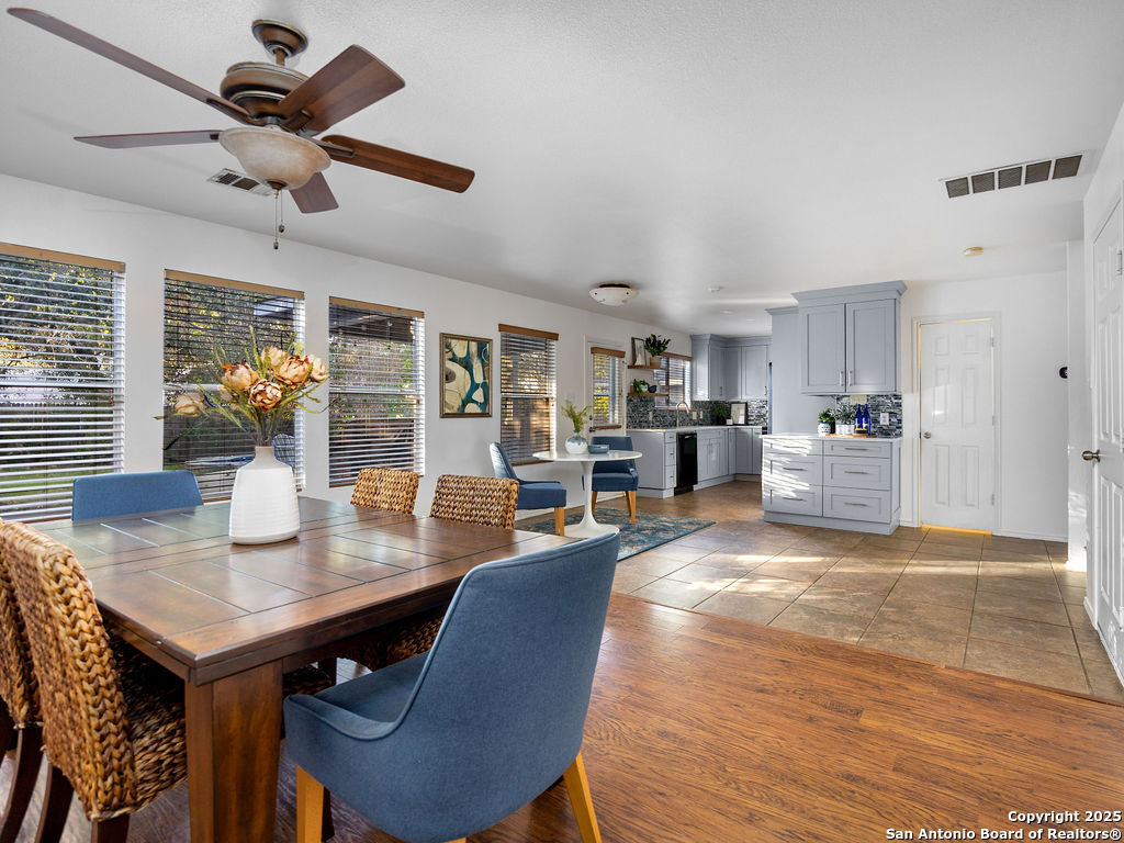 11031 Rindle Ranch San Antonio, TX 78249 - Photo 13 of 45 a view of a dining room with furniture