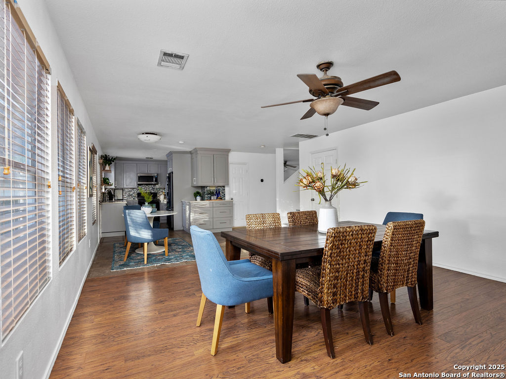 11031 Rindle Ranch San Antonio, TX 78249 - Photo 14 of 45 a view of a dining room with furniture