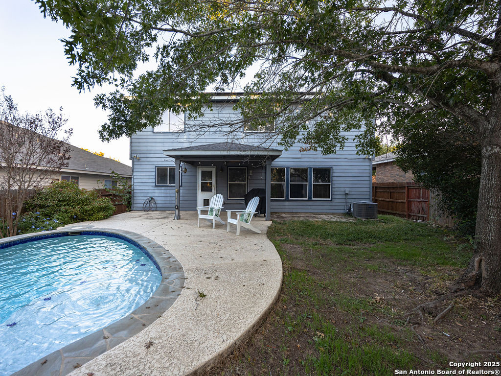 11031 Rindle Ranch San Antonio, TX 78249 - Photo 42 of 45 a view of a house with a backyard