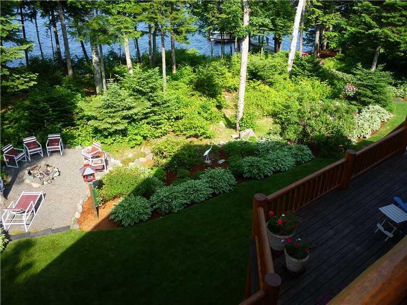 585 Big Moose Point Road Greenville, ME 04441 - Photo 4 of 30 Back Yard. Lakeside Fire Pit