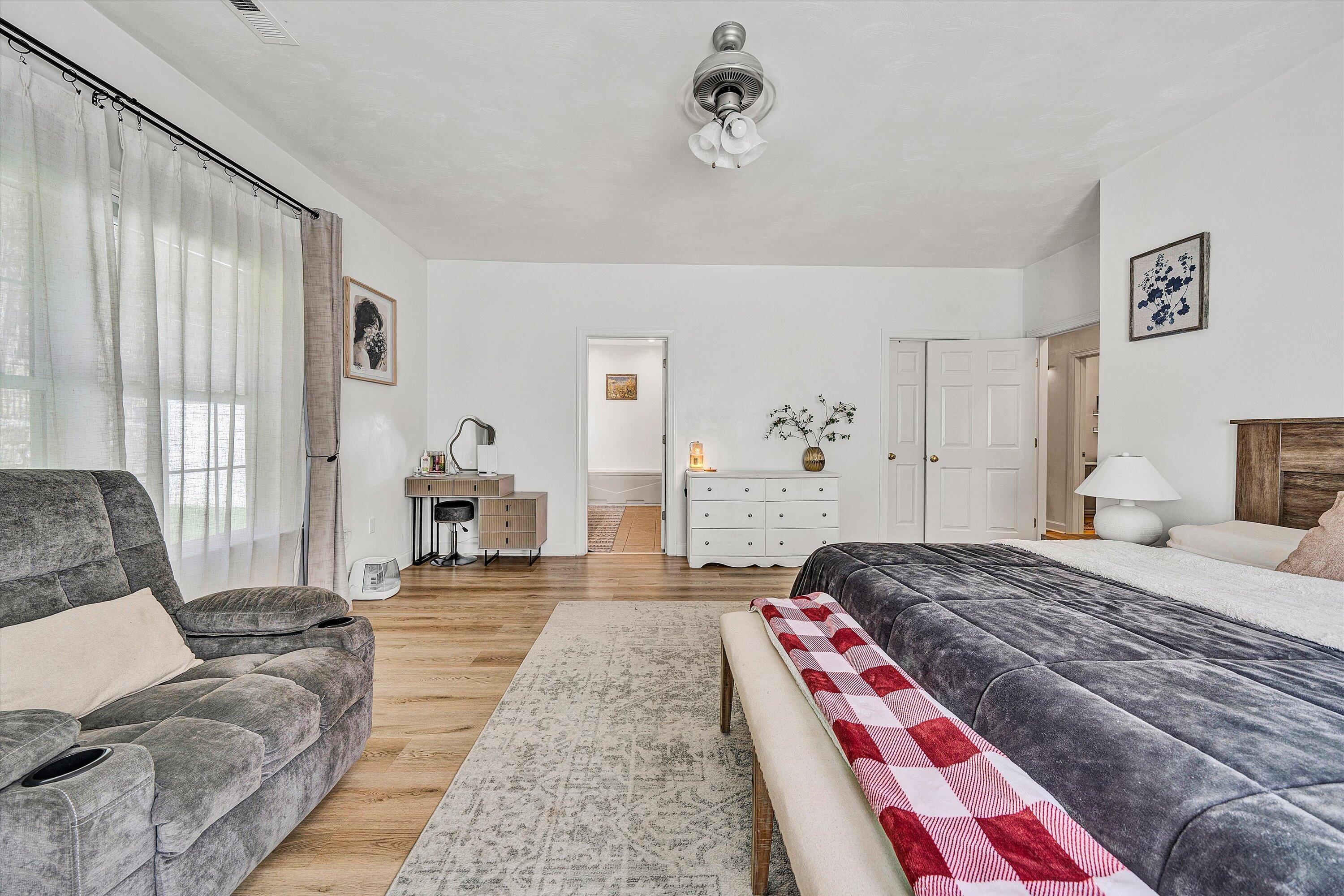 5424 Quail Ridge Court Roanoke, VA 24018 - Photo 24 of 41 a bedroom with a bed and a couch