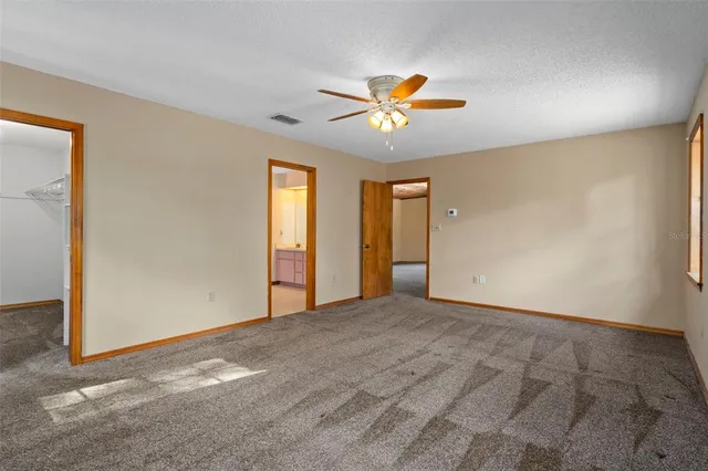 a view of a room with a large window