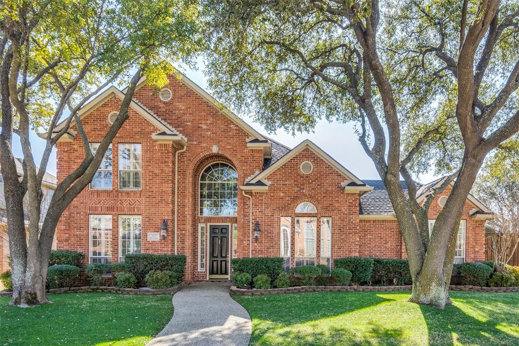 4616 Bush Drive Plano, TX 75093 - Photo 1 of 1 front view of a house with a yard